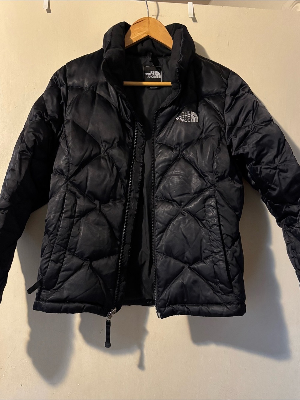 The North Face Black Quilted Down Jacket with White Logo